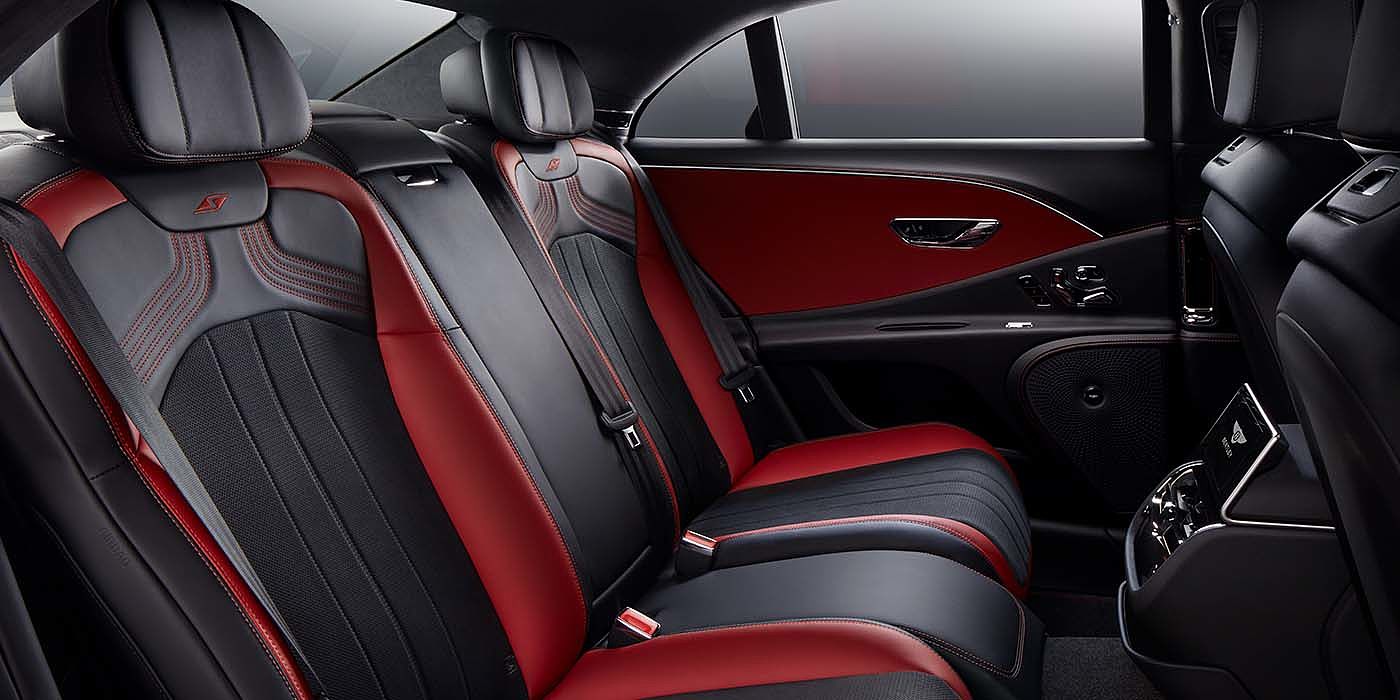 Bentley Santo Domingo Bentley Flying Spur S sedan rear interior in Beluga black and Hotspur red hide with S stitching