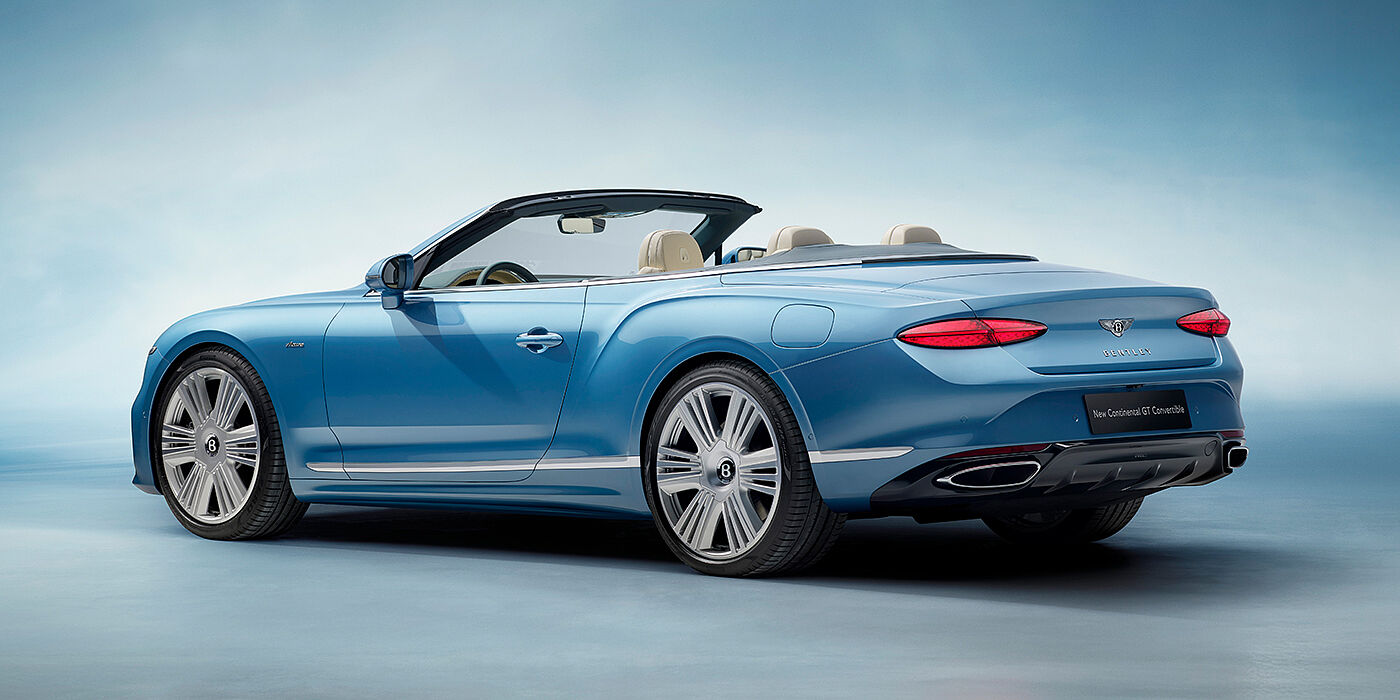 Bentley Santo Domingo New Bentley Continental GTC Azure convertible rear view in Light Windsor blue paint with 22 inch ten spoke wheels and chrome exterior details