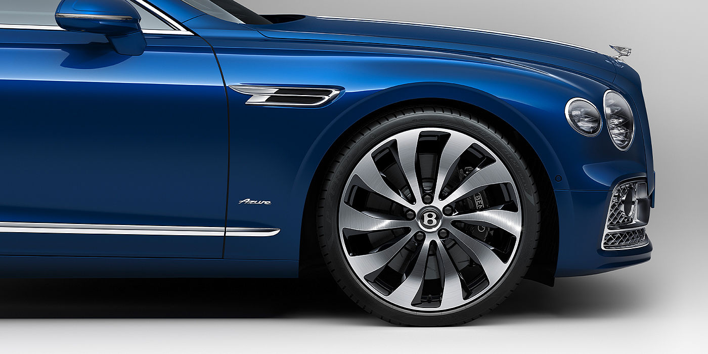 Bentley Santo Domingo Bentley Flying Spur Azure sedan side close up in Sequin Blue paint with Azure badge