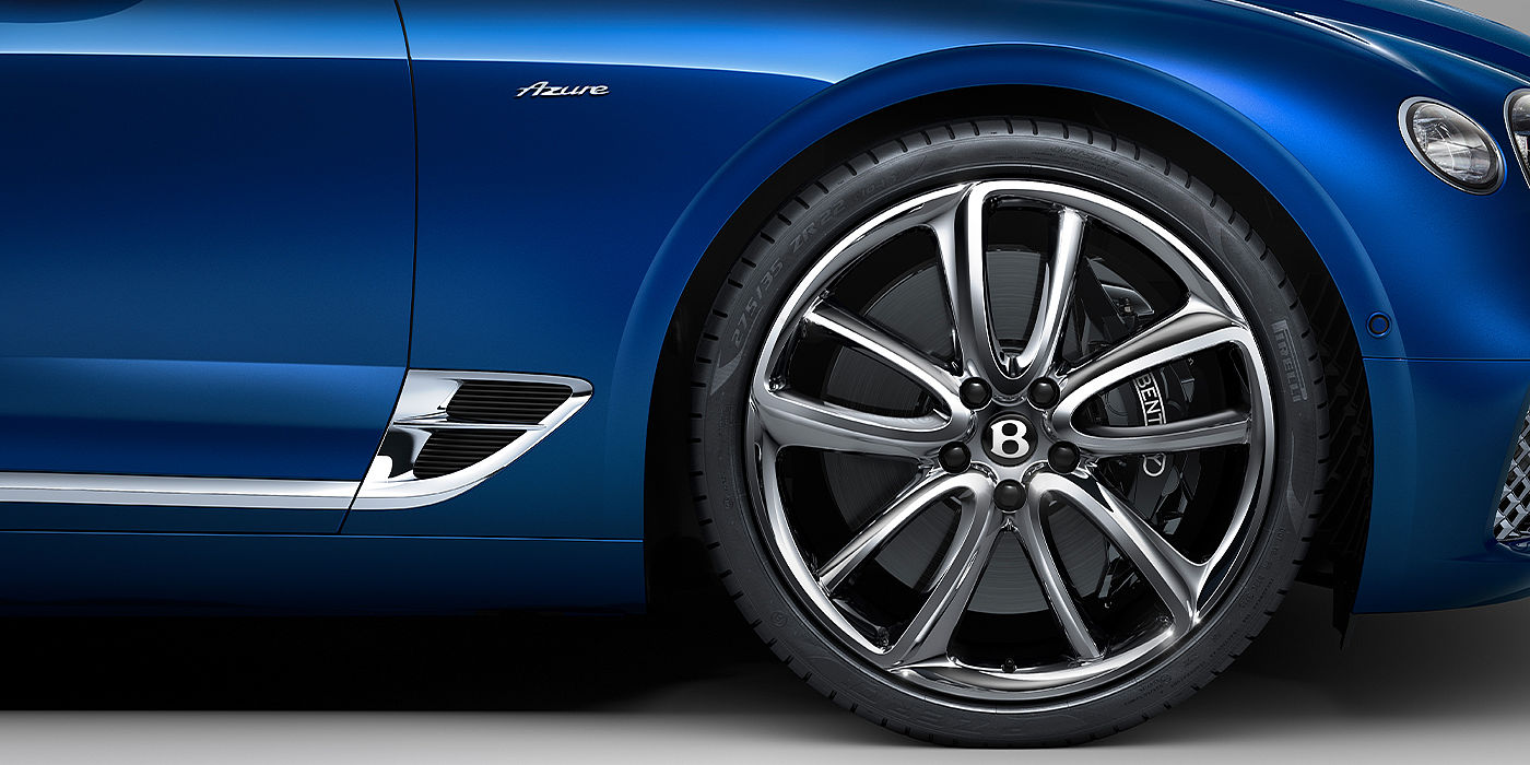Bentley Santo Domingo Bentley Continental GTC Azure convertible in Sequin Blue paint side profile with Azure badge close up